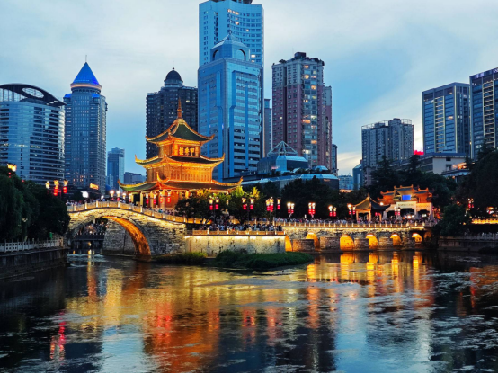 Jiaxiu Tower reflected in the Nanming River at night