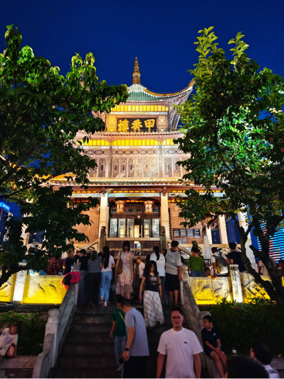 Historic Jiaxiu Tower illuminated at night