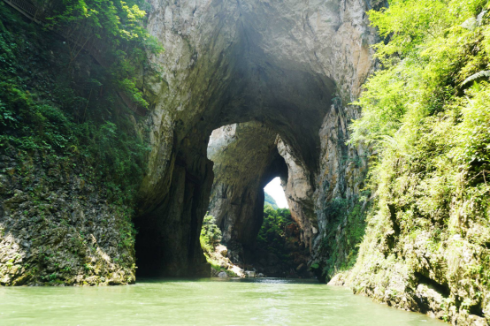 Natural skylight above the underground river at Jiudongtian