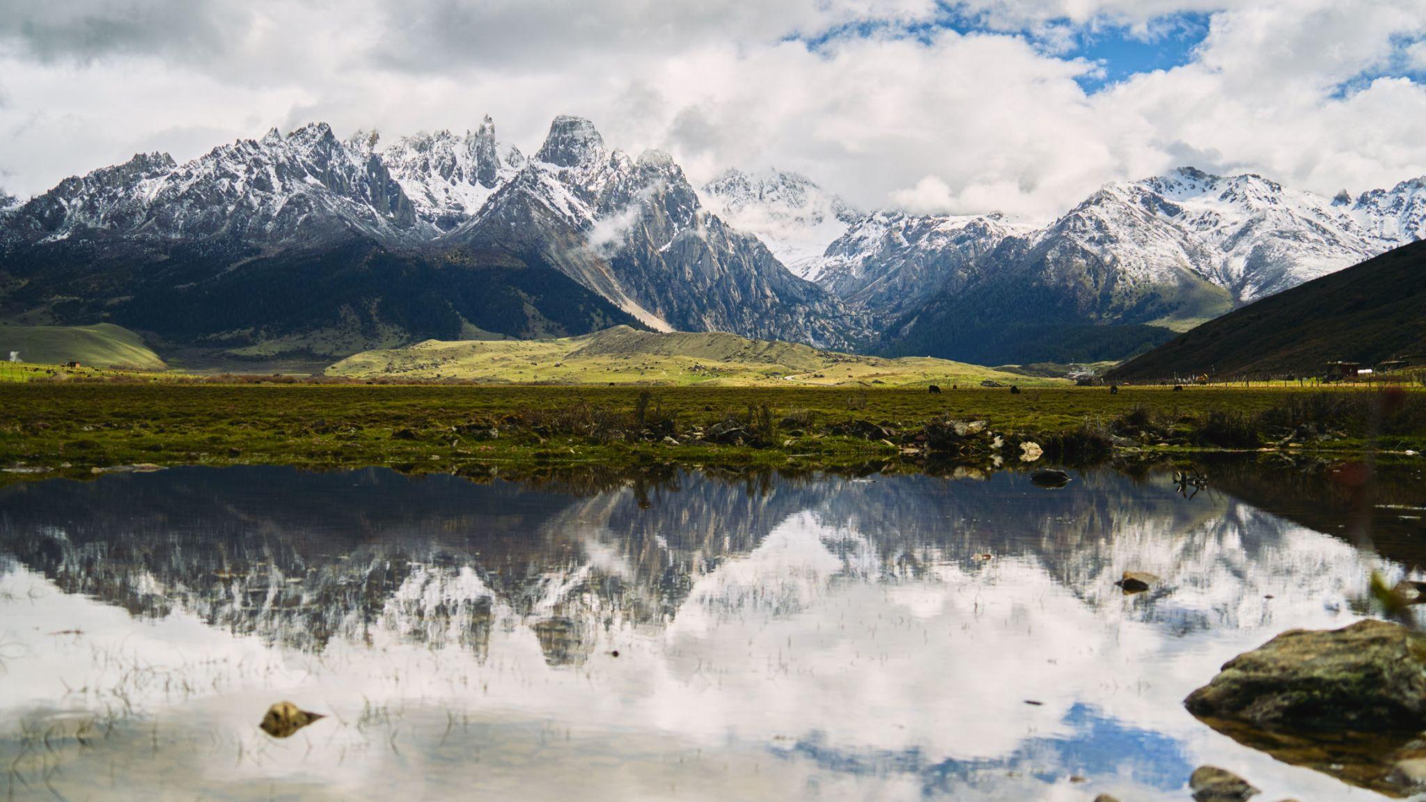 View of Zhangde Grassland and Mount Jarjinjabo, Batang, Garze, Sichuan