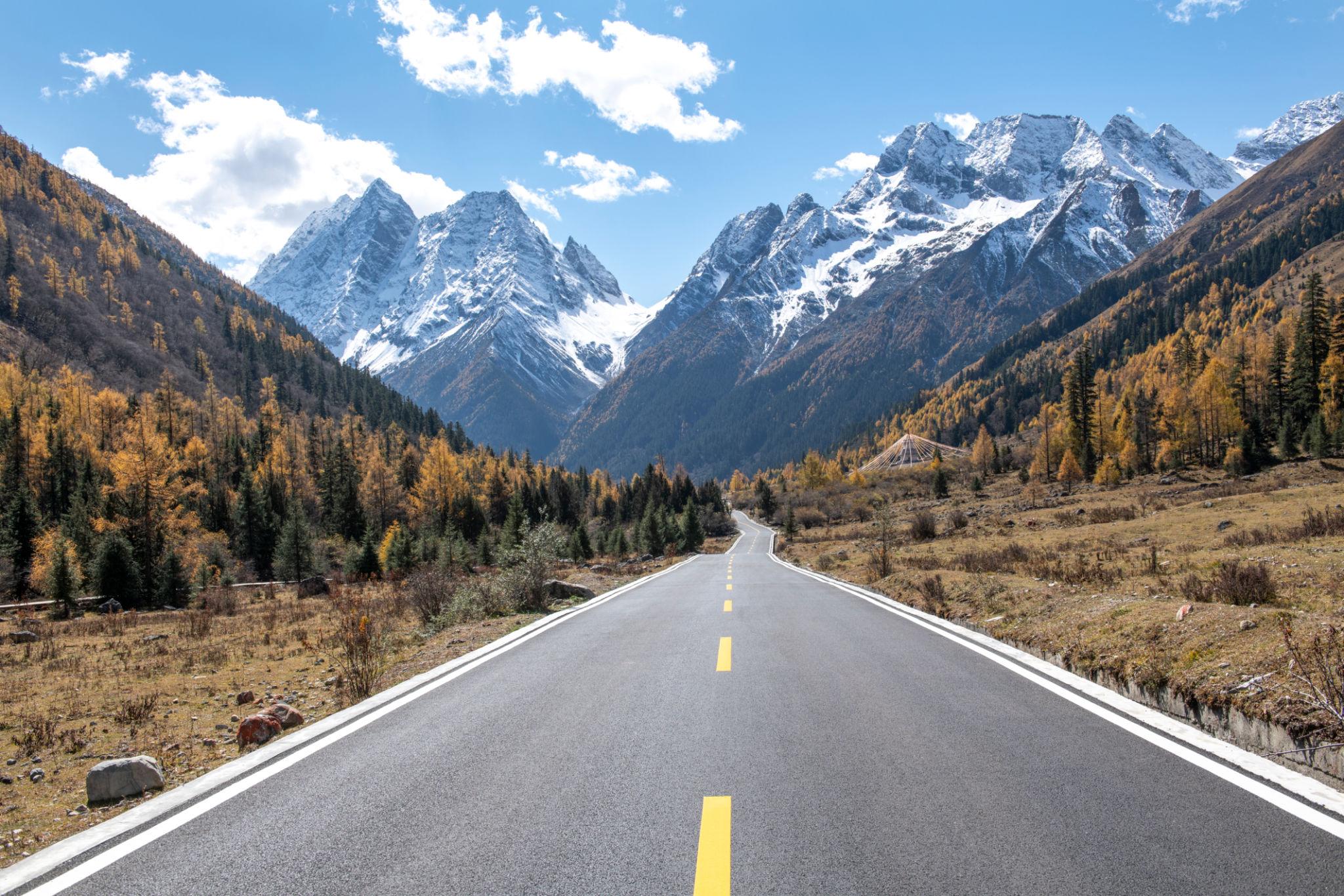 Siguniang Mountain, Sichuan Province, China Snow Mountain and Road