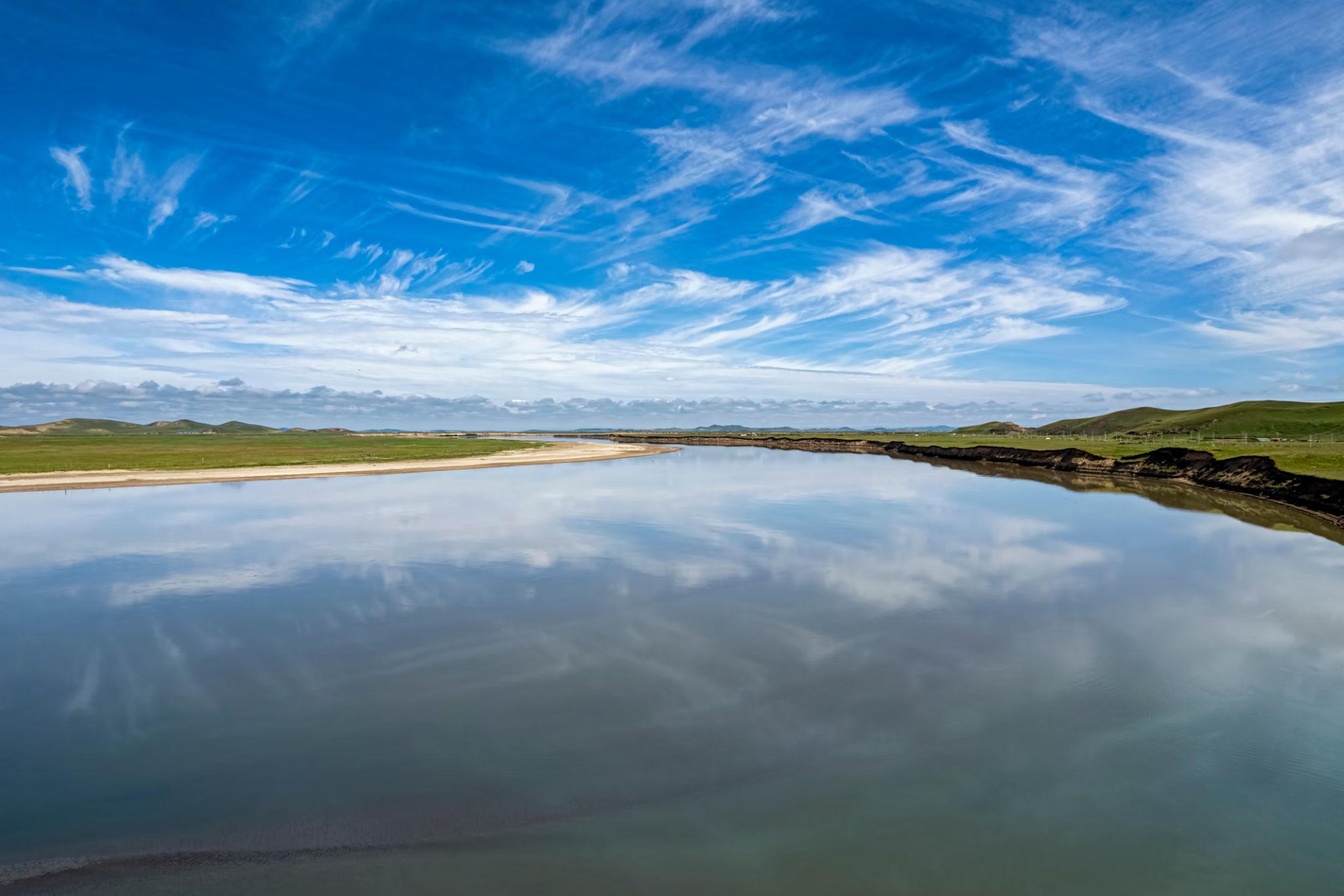 Yellow River in Ruoergai grasslands with sky reflection